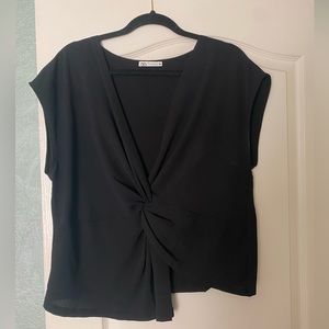 Asymmetrical black crepe blouse